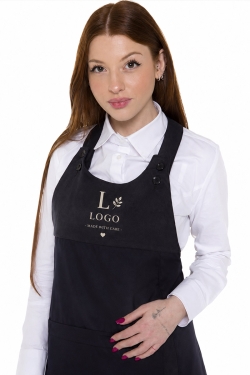 Tablier bleu avec détails en daim personnalisé avec un logo brodé