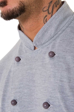 detalle del tejido piqué de la chaqueta de chef gris